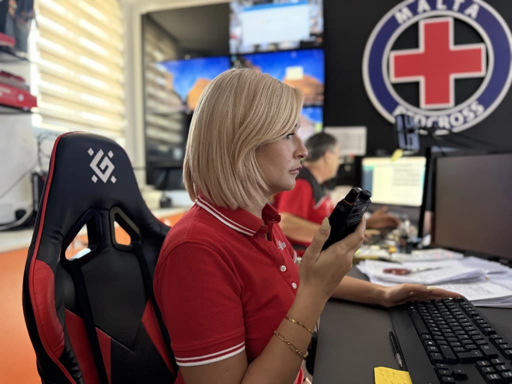 Malta Red Cross operator coordinating services from the control room